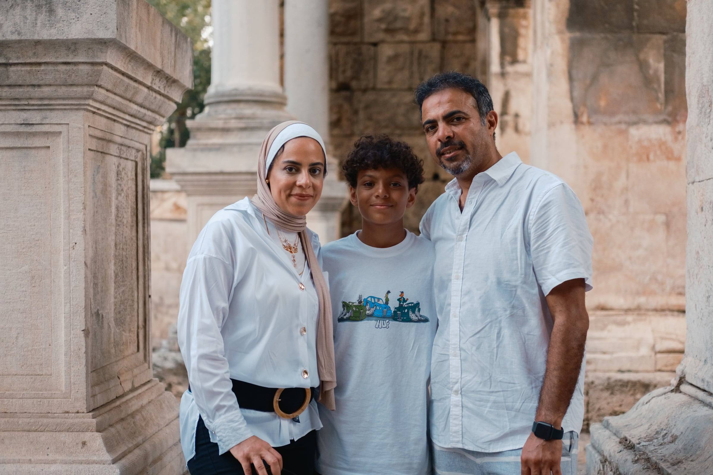 Parents with their son at the marble gate
